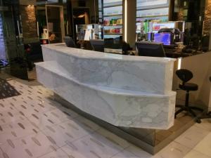 Стойка ресепшен из гранита Sonya